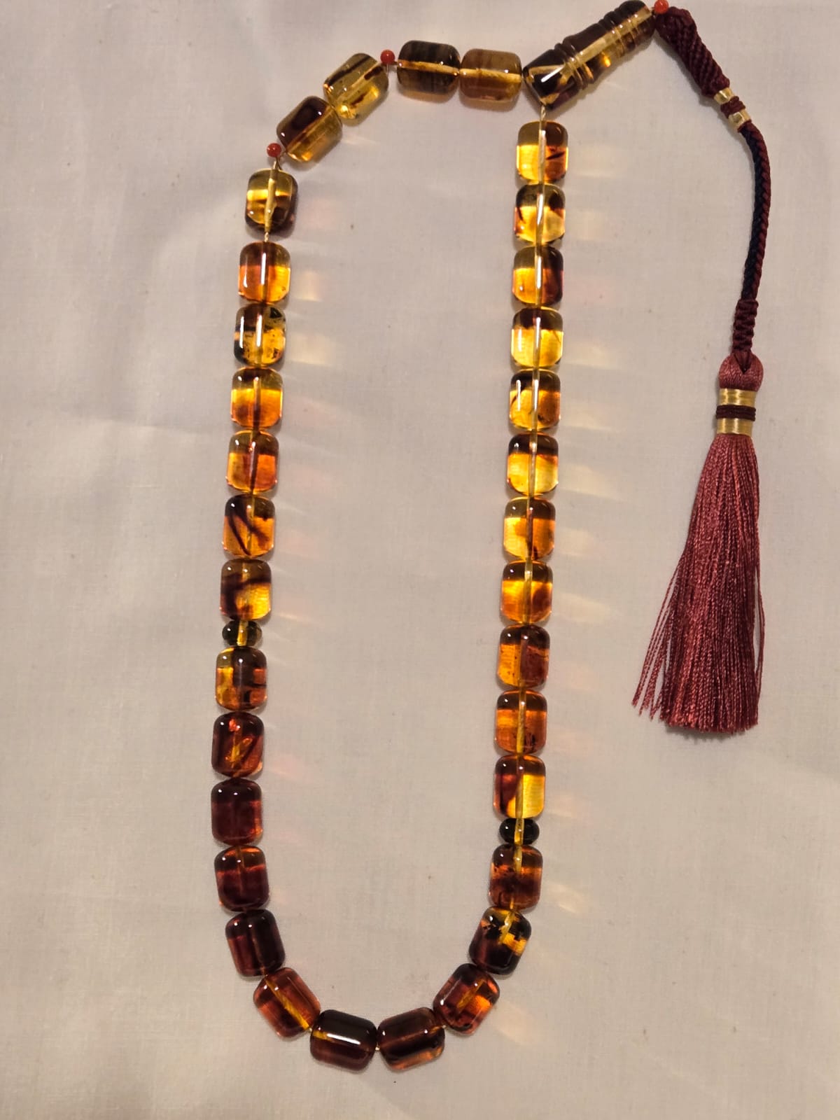 Amber 35grms 33 beads 13 X 10 mm Finished tassell